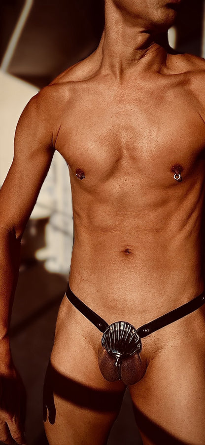 Twitter User: LockedAlpha wearing the Shell Invisible Chastity Cage | F277